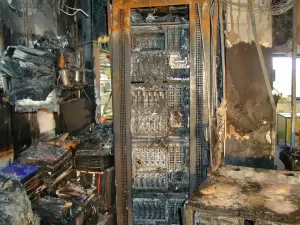 A server room with burnt equipment resembling a physical manifestation of 5xx status codes.