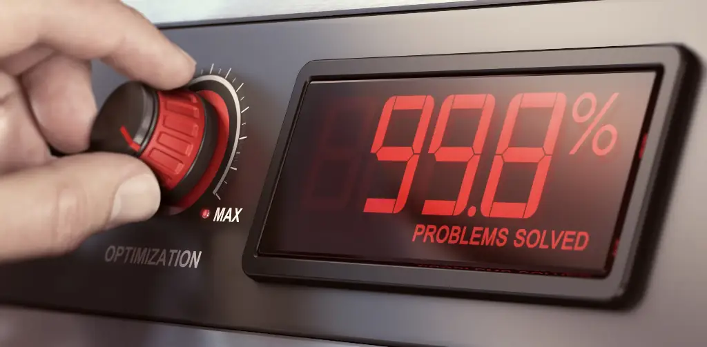 A person activates a machine using a button to address a problem.