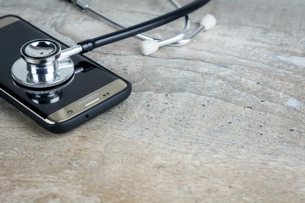 A smartphone equipped with a stethoscope for medical purposes.
