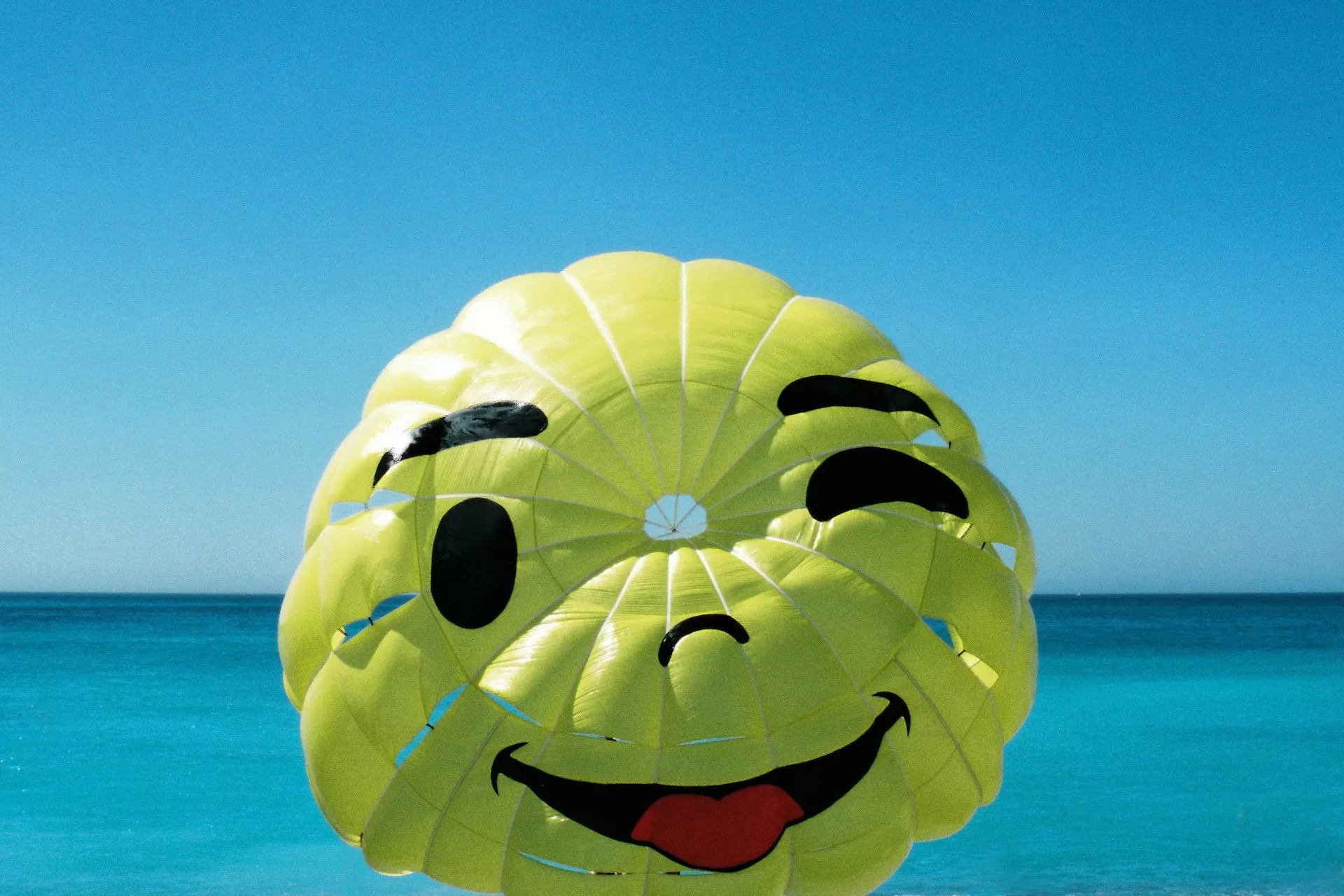 A smiley-faced kite.