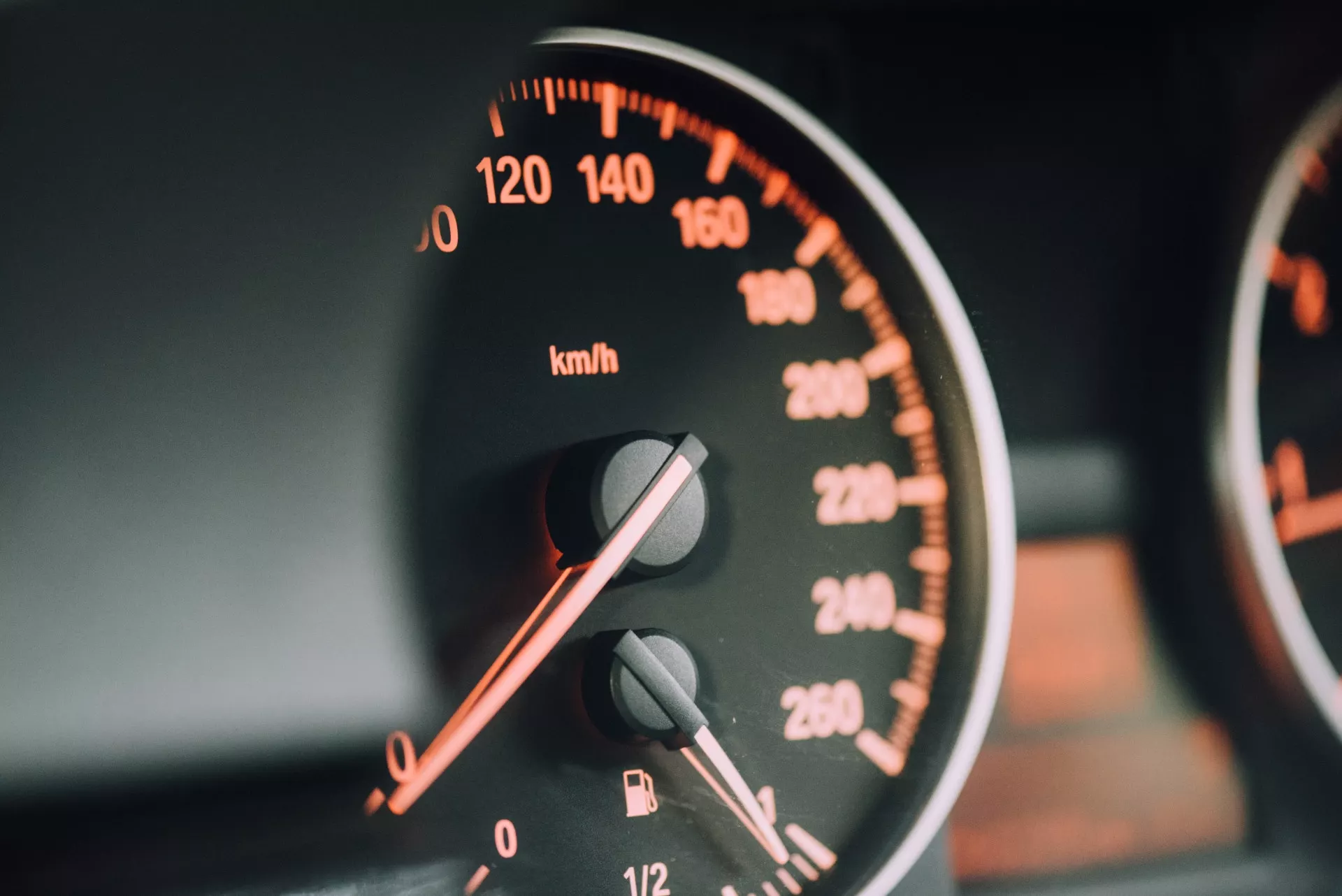 A close up of a car speedometer during a technical audit.